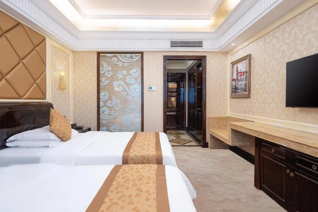 Bed in Sun City Hotel Haikou