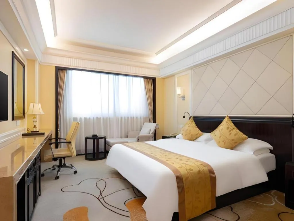 Bed in Sun City Hotel Haikou