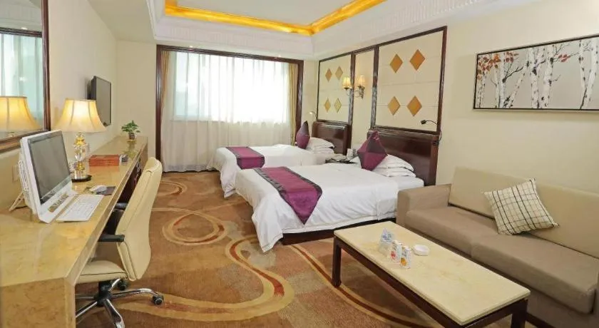 Bed in Sun City Hotel Haikou