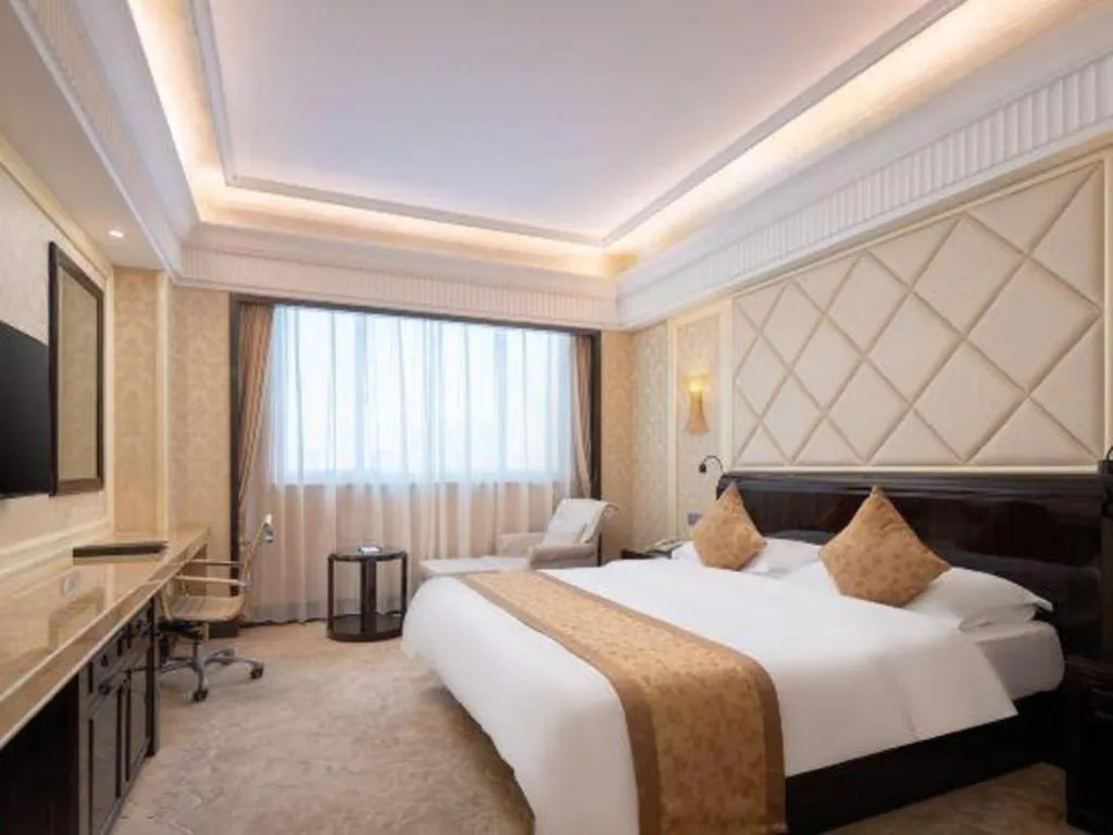 Bed in Sun City Hotel Haikou