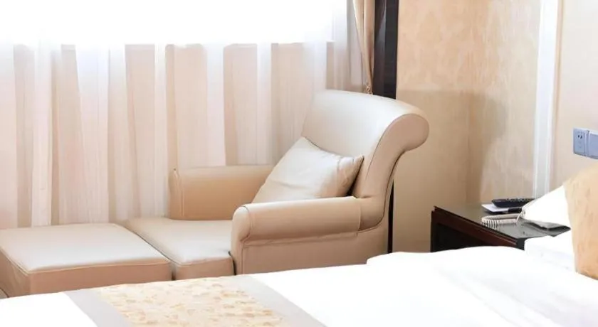 Bed in Sun City Hotel Haikou