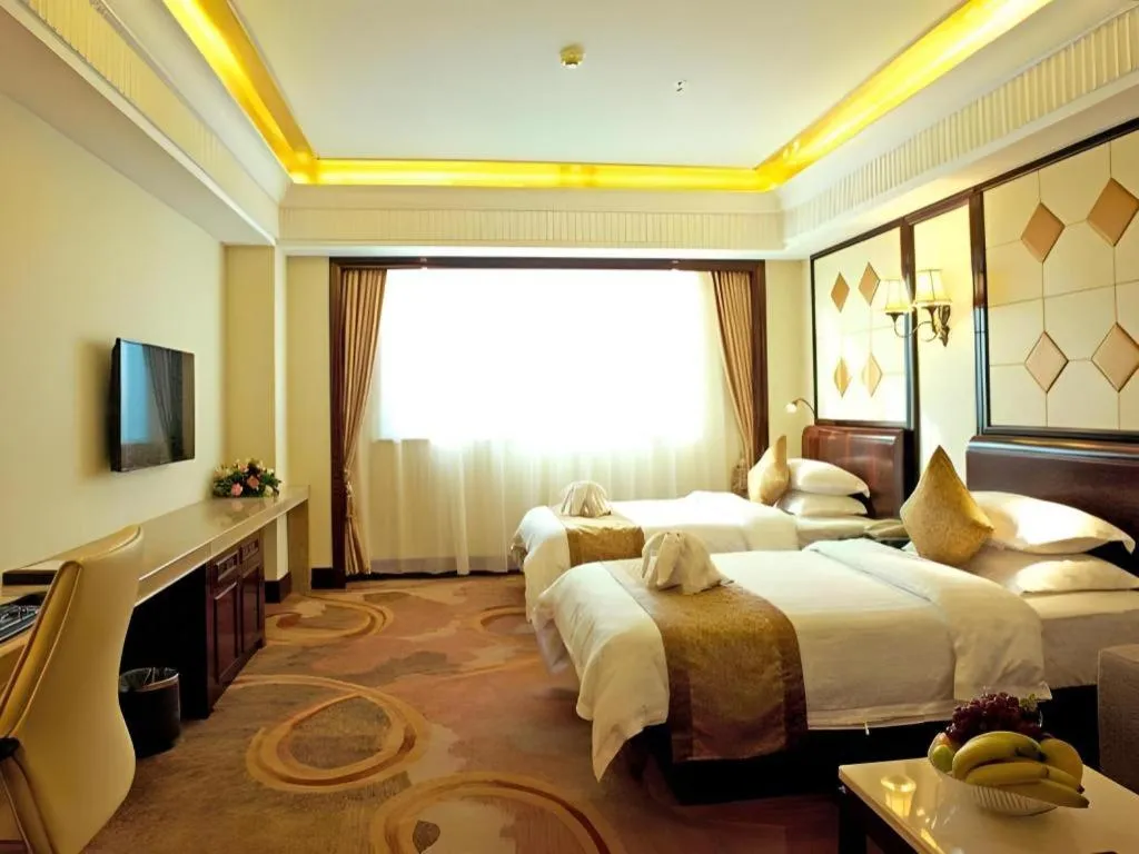Bed in Sun City Hotel Haikou