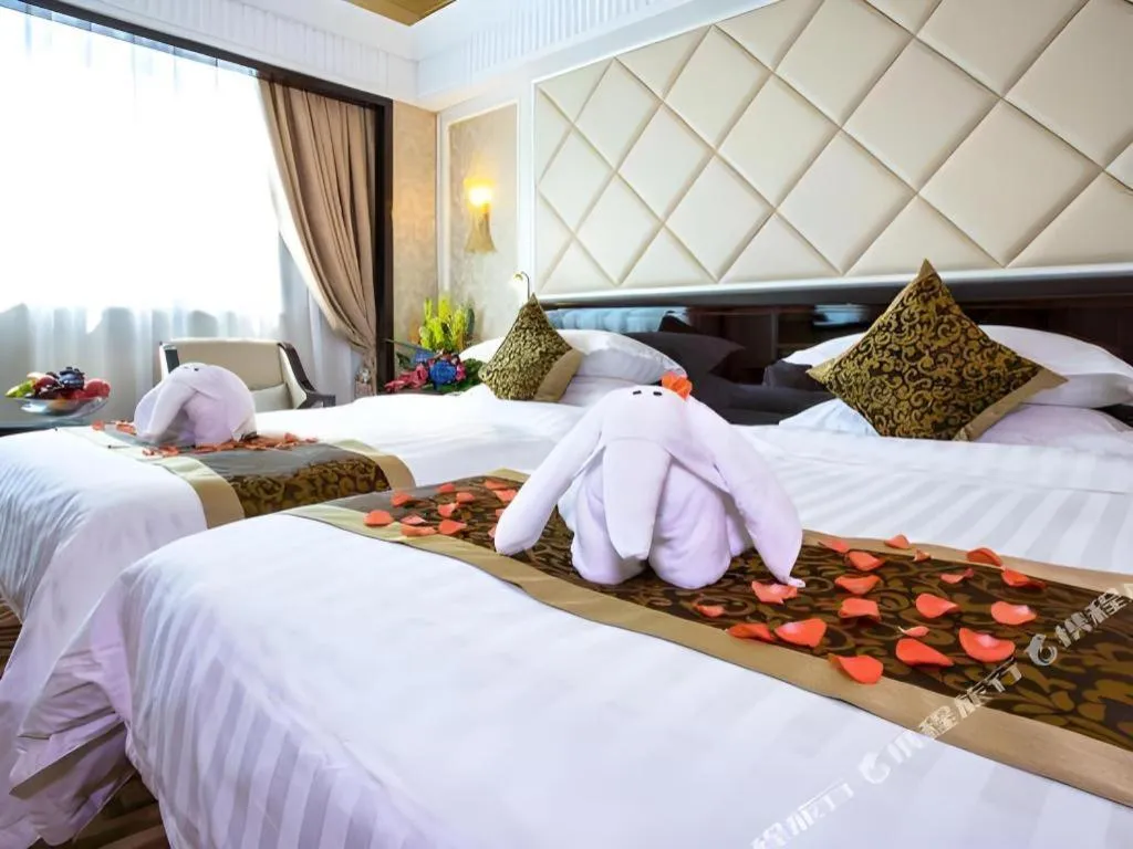 Bed in Sun City Hotel Haikou