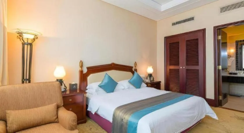 Bed in Sun City Hotel Haikou