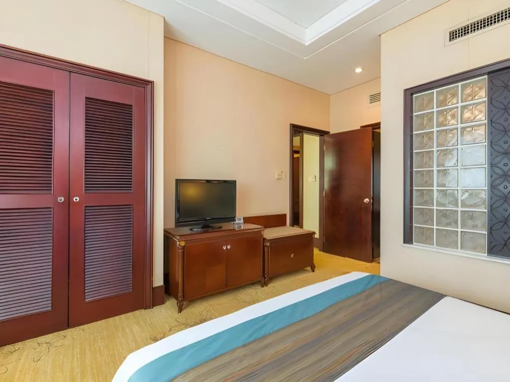 Bed in Sun City Hotel Haikou