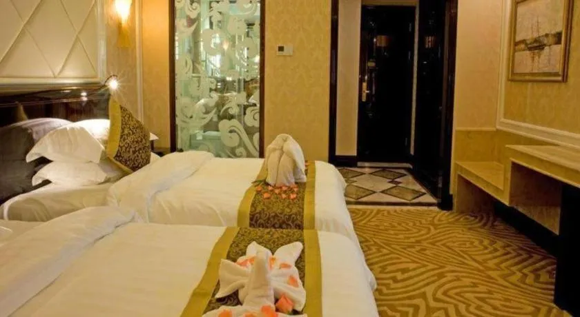 Bed in Sun City Hotel Haikou