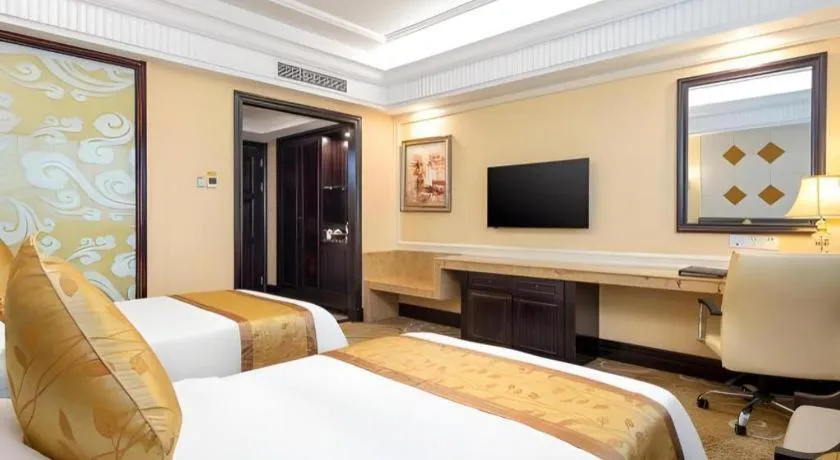 Bed in Sun City Hotel Haikou