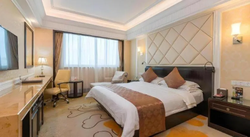 Bed in Sun City Hotel Haikou