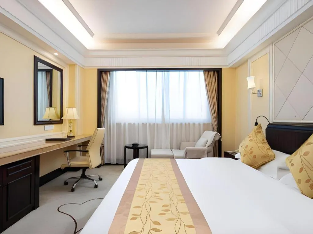 Bed in Sun City Hotel Haikou