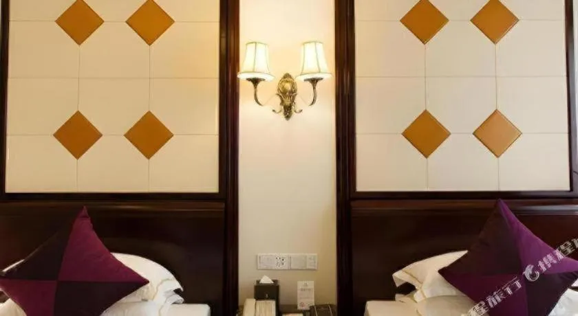 Bed in Sun City Hotel Haikou