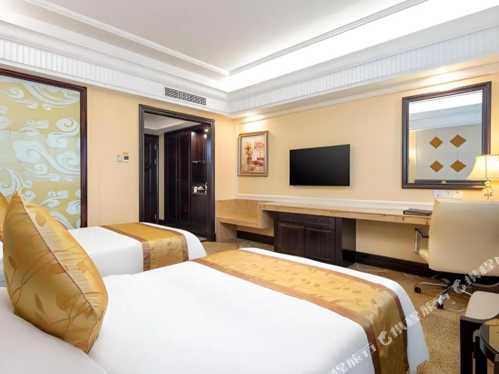 Bed in Sun City Hotel Haikou