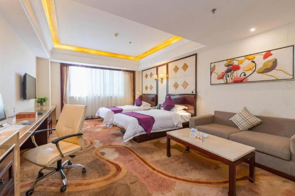 Bed in Sun City Hotel Haikou
