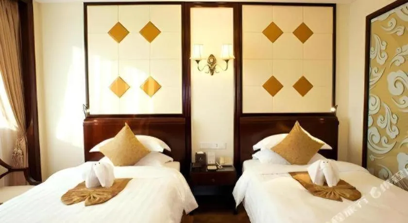 Bed in Sun City Hotel Haikou