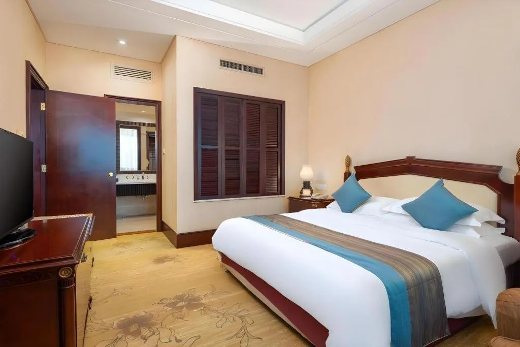 Bed in Sun City Hotel Haikou