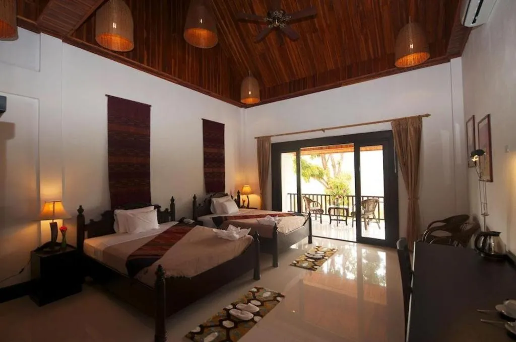 Bed in Nam Ou Riverside Resort