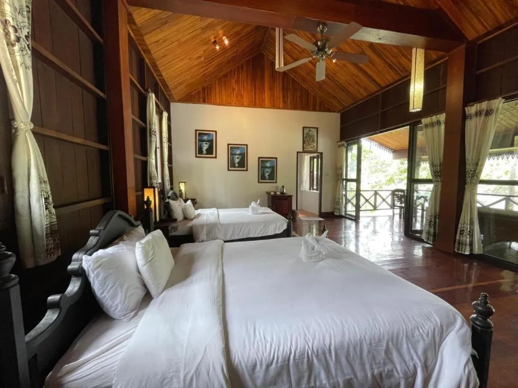 Bed in Nam Ou Riverside Resort