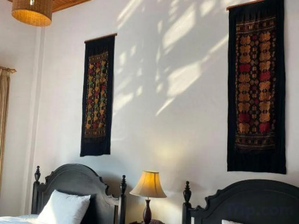 Bed in Nam Ou Riverside Resort