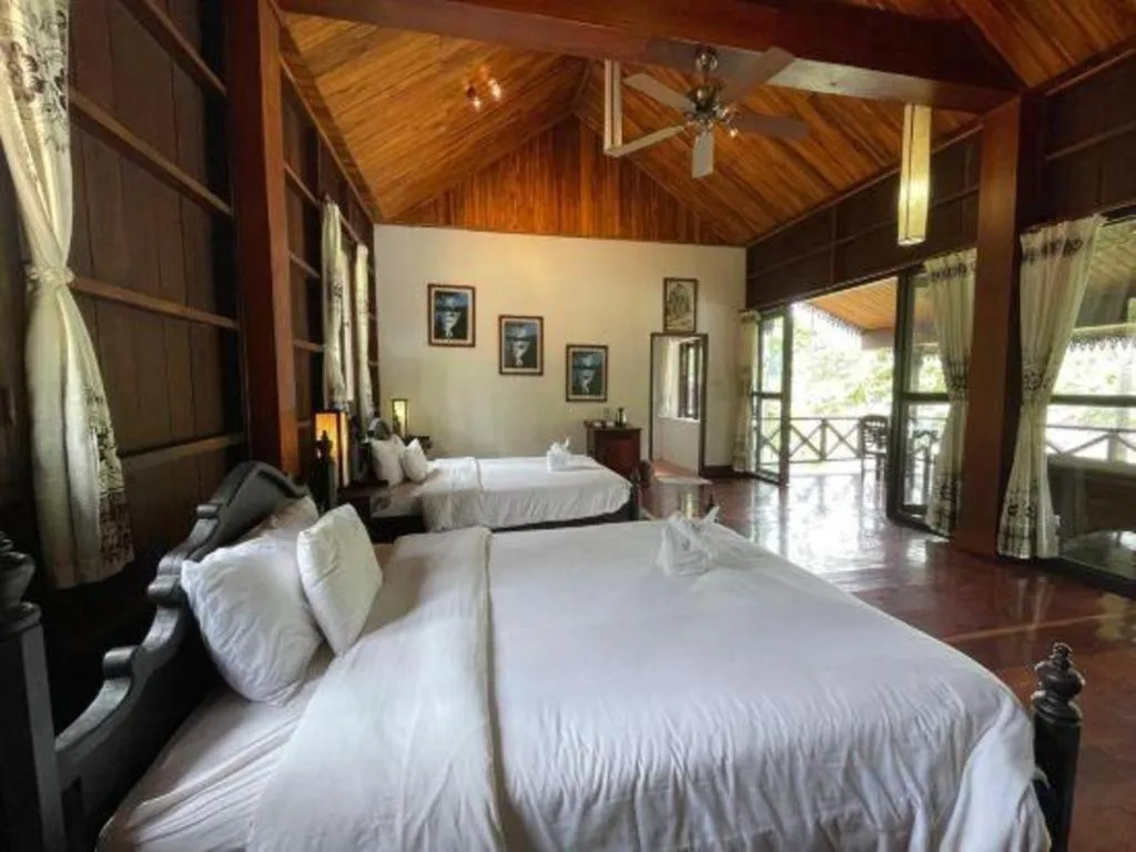 Bed in Nam Ou Riverside Resort