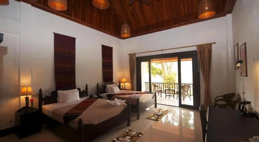 Bed in Nam Ou Riverside Resort