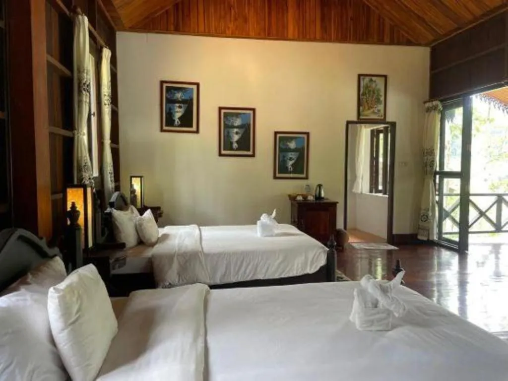 Bed in Nam Ou Riverside Resort