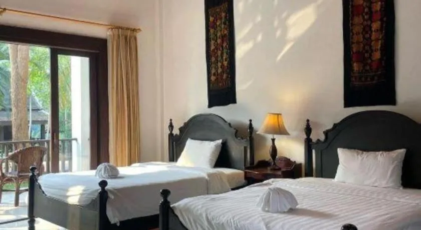 Bed in Nam Ou Riverside Resort