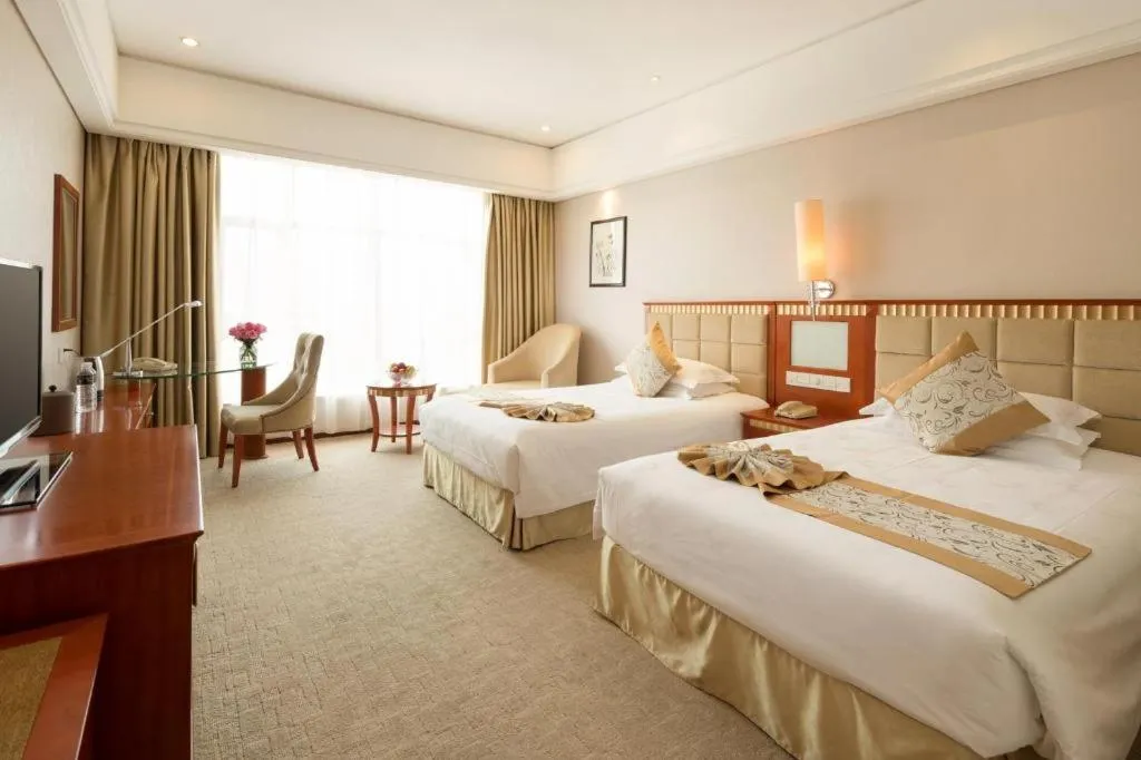 Bed in Zhangjiajie Qinghe Jinjiang International Hotel