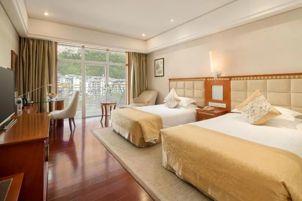 Bed in Zhangjiajie Qinghe Jinjiang International Hotel