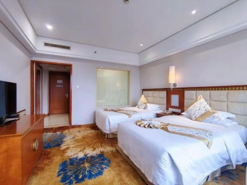 Bed in Zhangjiajie Qinghe Jinjiang International Hotel