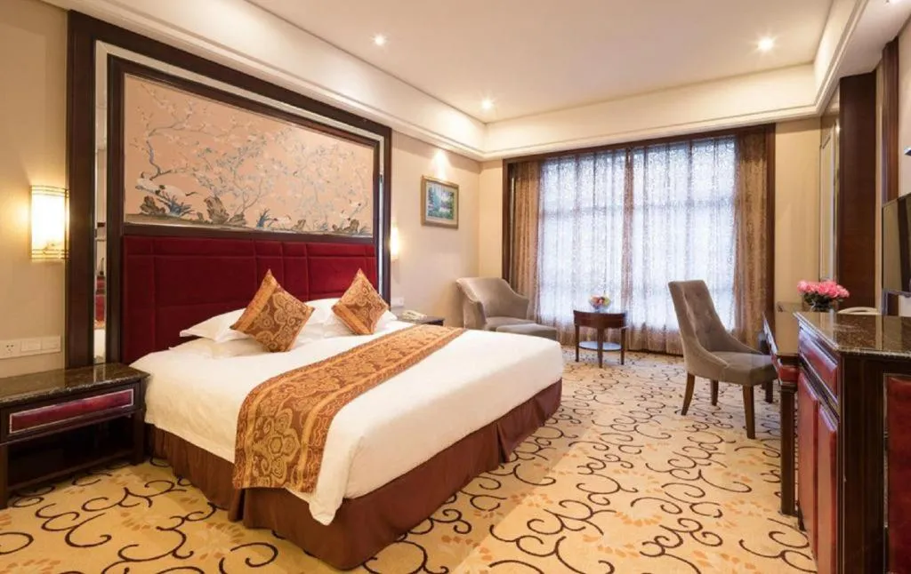 Bed in Zhangjiajie Qinghe Jinjiang International Hotel