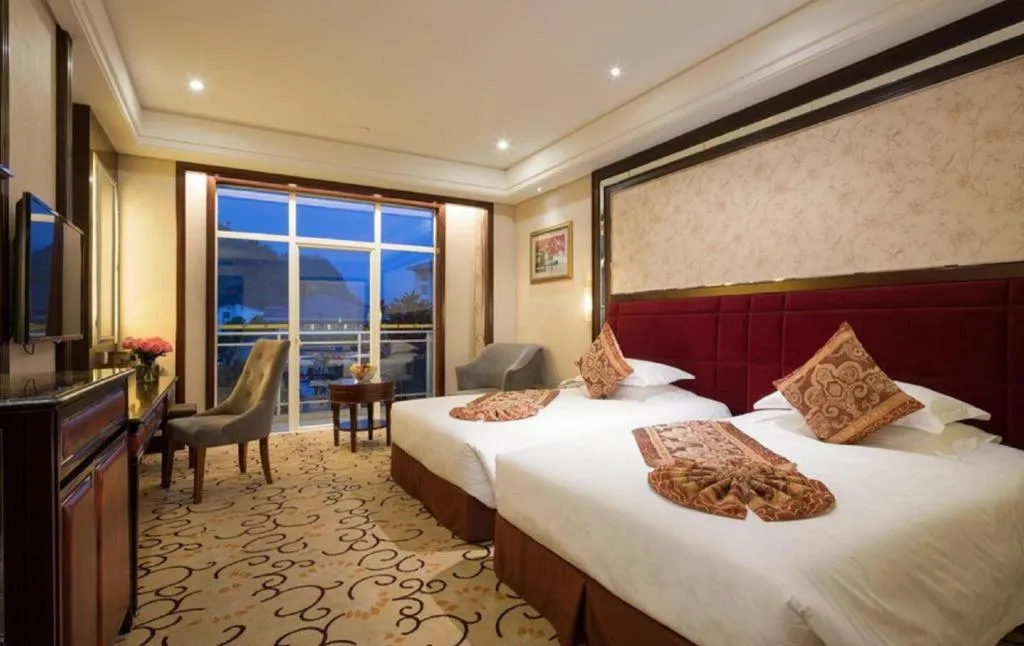 Bed in Zhangjiajie Qinghe Jinjiang International Hotel