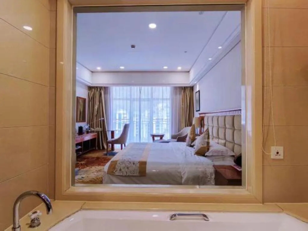 Bed in Zhangjiajie Qinghe Jinjiang International Hotel