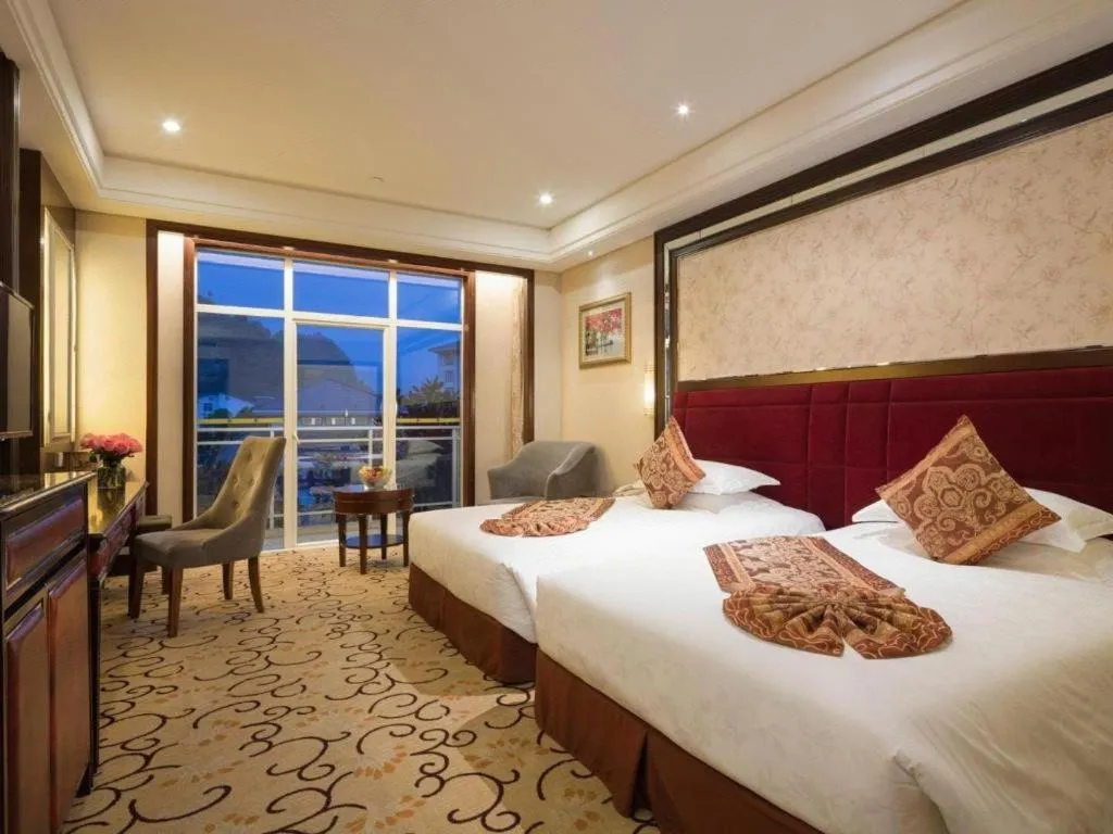 Bed in Zhangjiajie Qinghe Jinjiang International Hotel