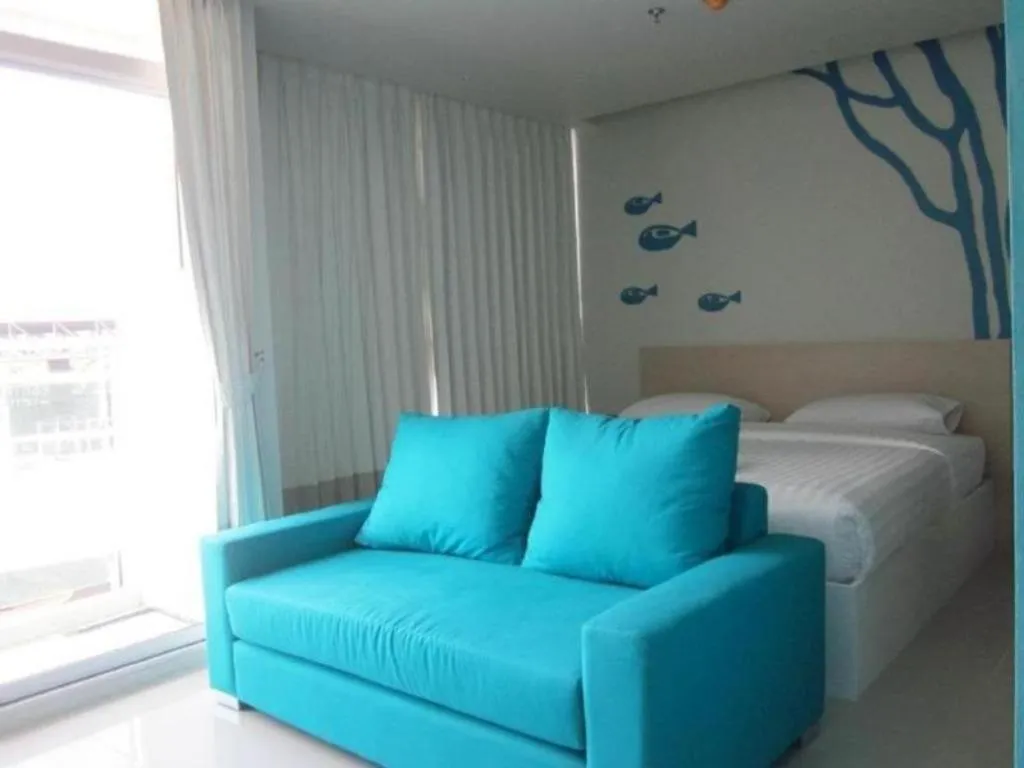 Bed in R-Con Blue Ocean Hotel