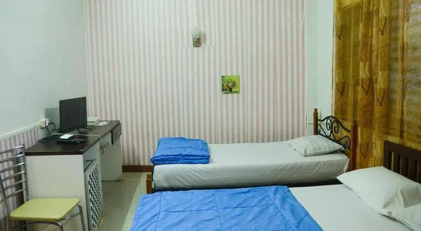 Bed in Chinawat Hotel