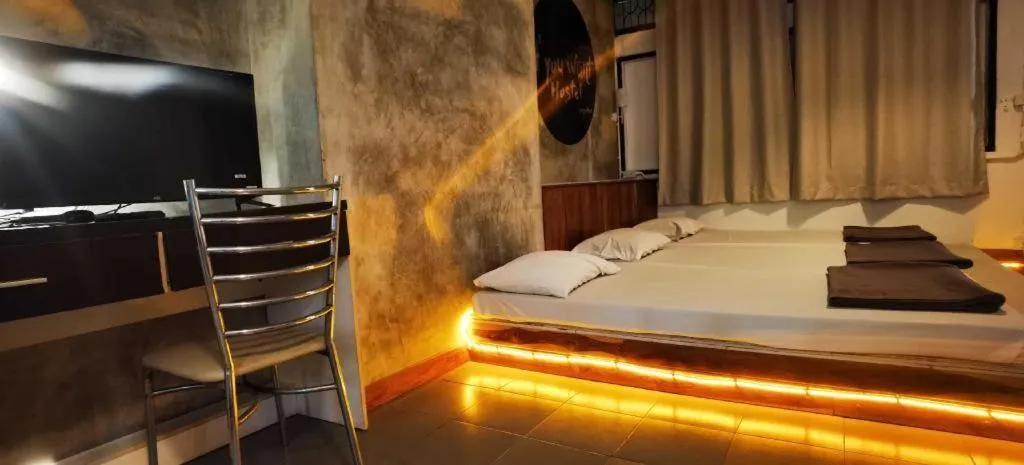 Bed in Chinawat Hotel