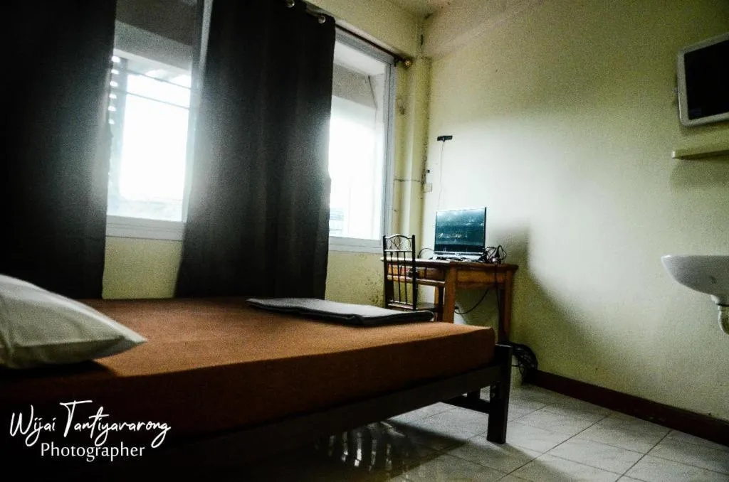 Bed in Chinawat Hotel