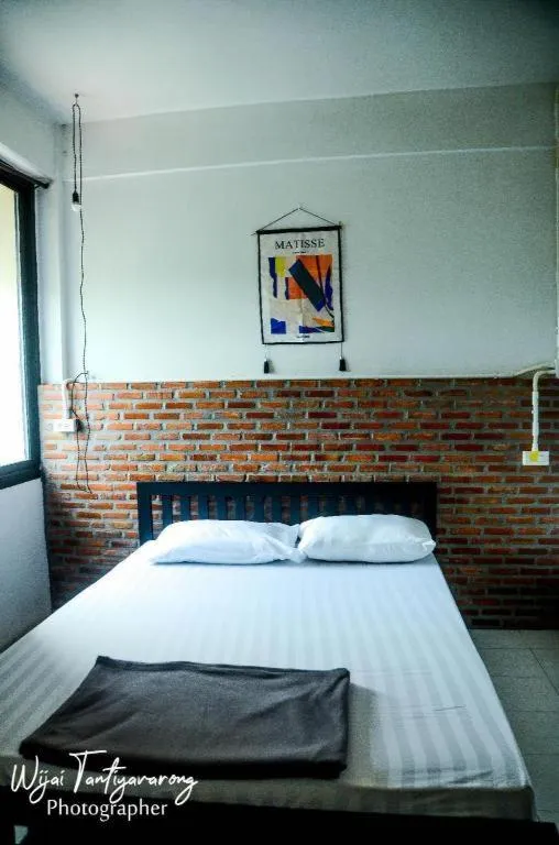 Bed in Chinawat Hotel