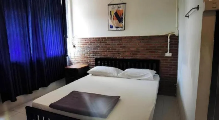 Bed in Chinawat Hotel