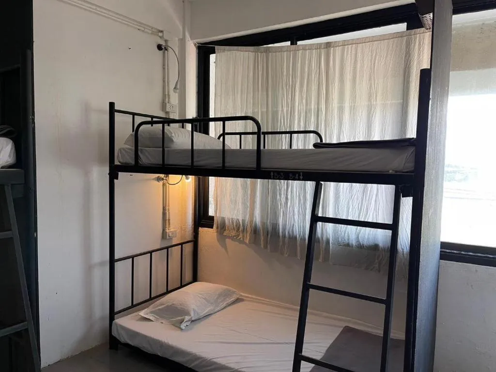 Bed in Chinawat Hotel