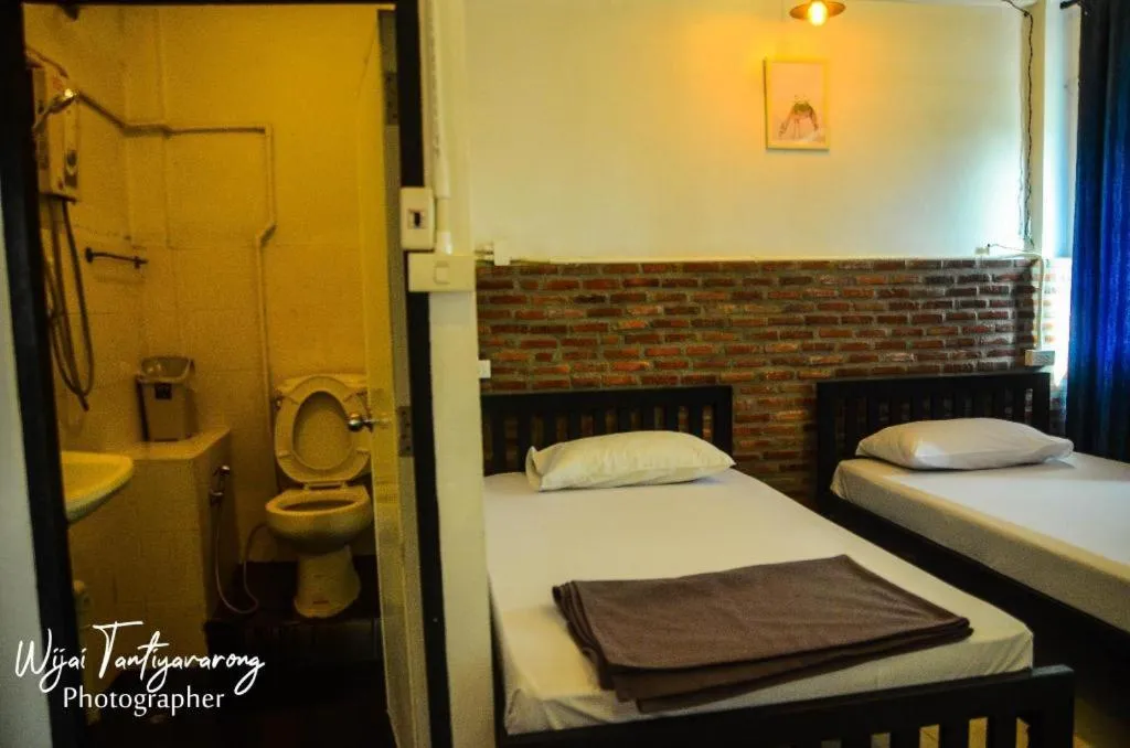 Bed in Chinawat Hotel