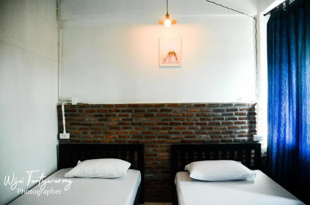 Bed in Chinawat Hotel