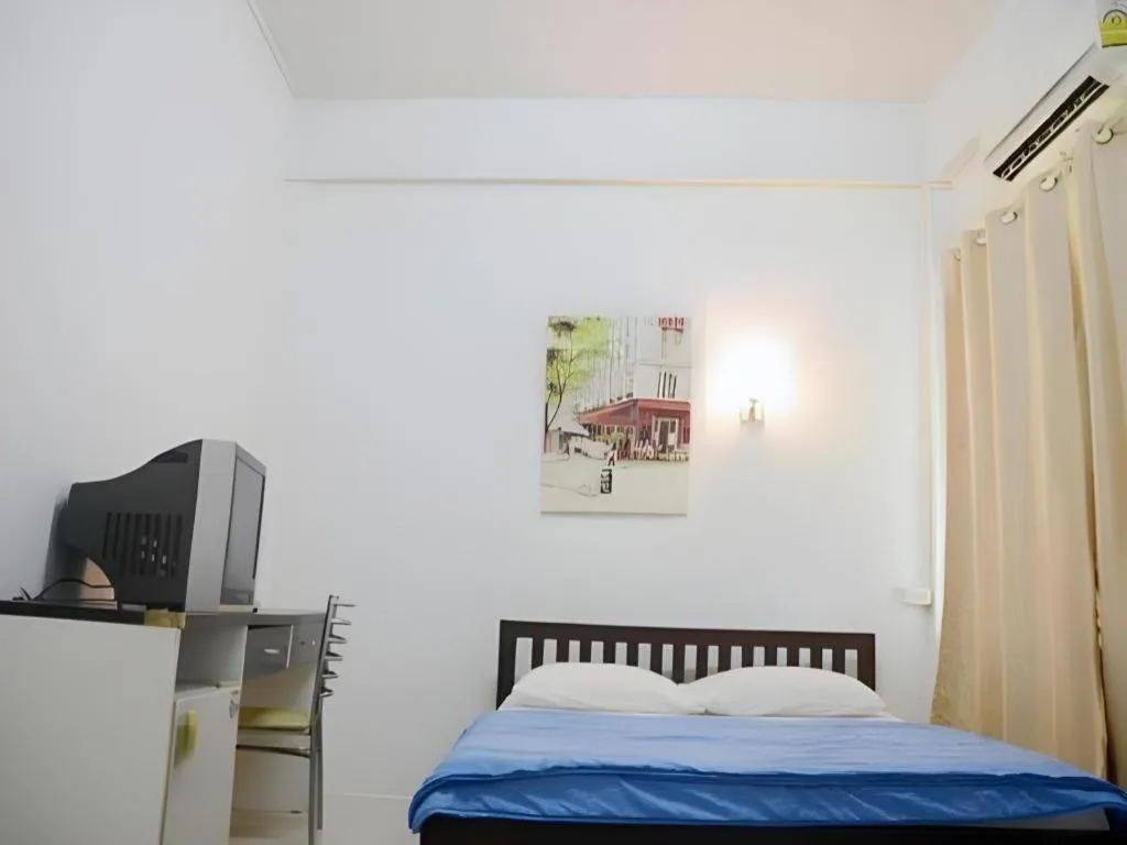 Bed in Chinawat Hotel