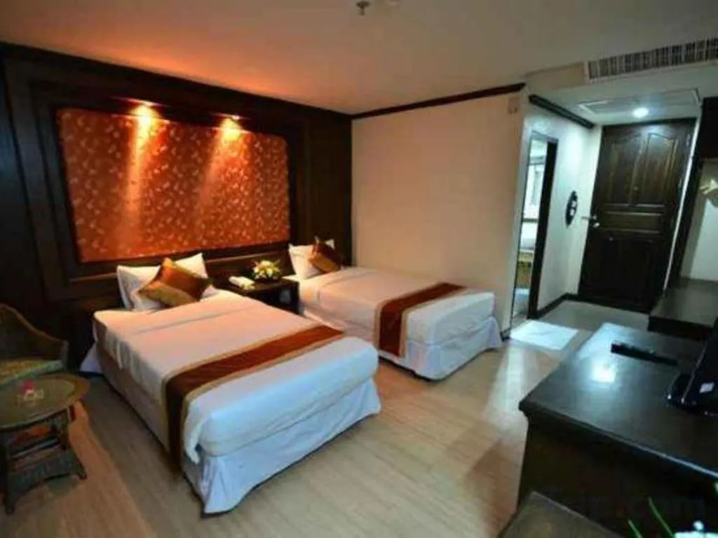 Bed in Piyaporn Pavilion Hotel