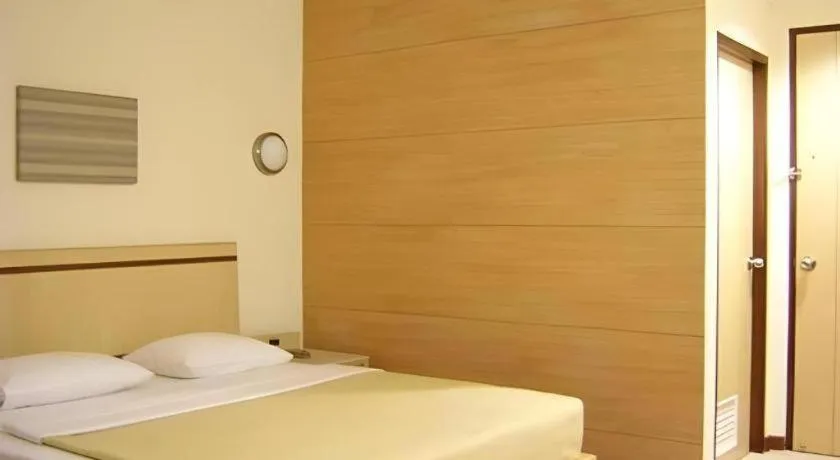 Bed in Gajahmada Avara Boutique Hotel