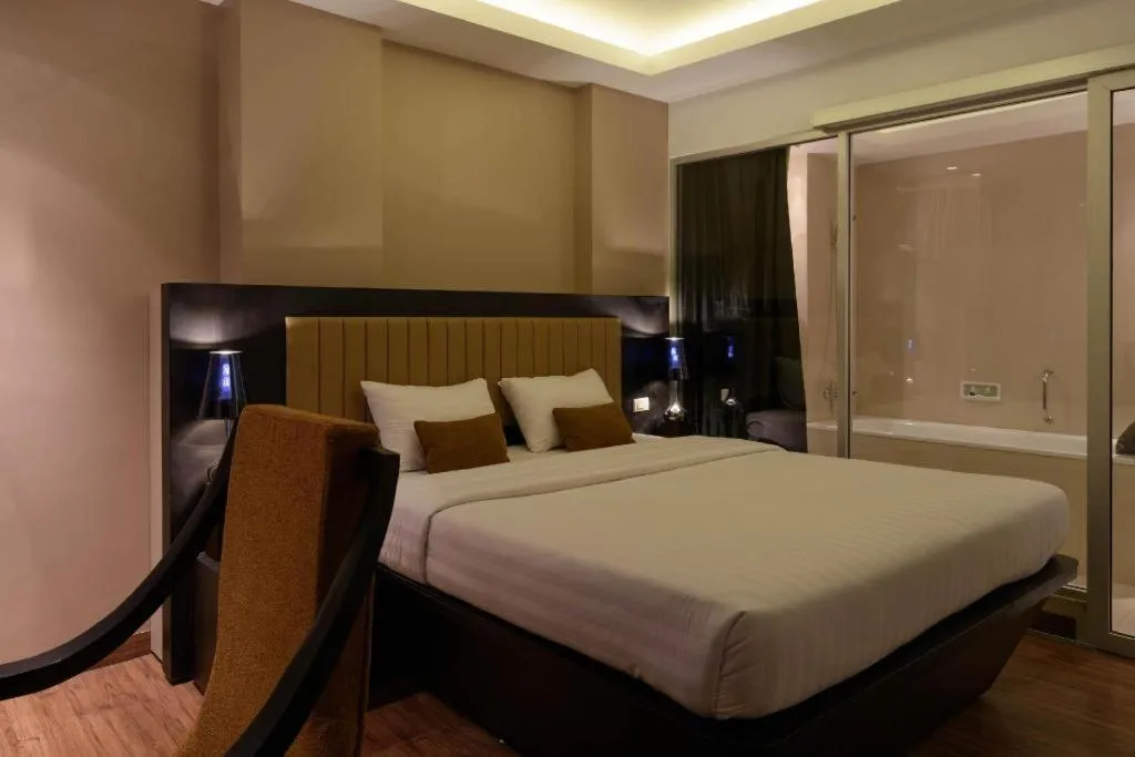 Bed in Gajahmada Avara Boutique Hotel