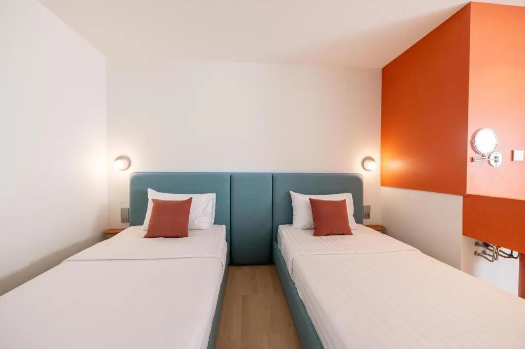 Bed in 777Bliss Hometel