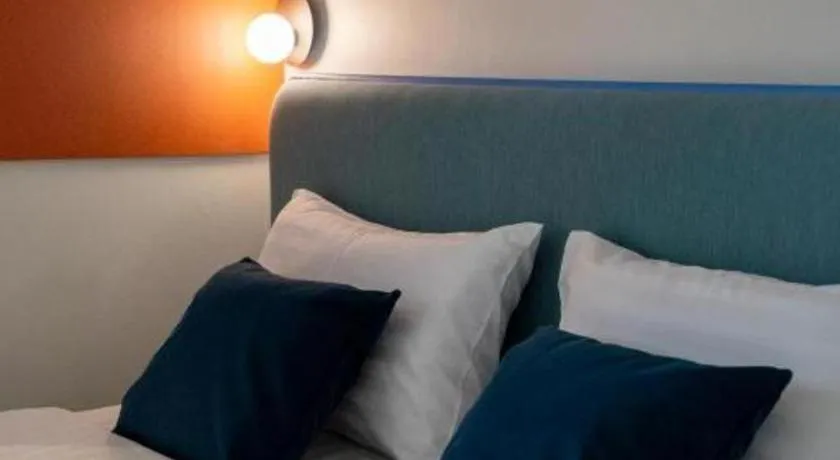 Bed in 777Bliss Hometel