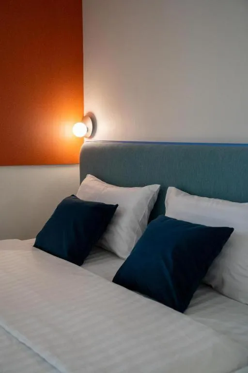 Bed in 777Bliss Hometel