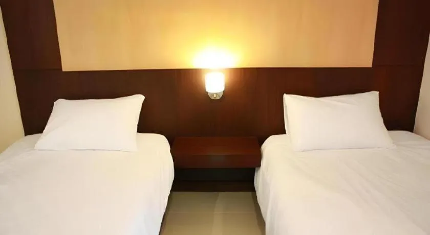 Bed in 777Bliss Hometel