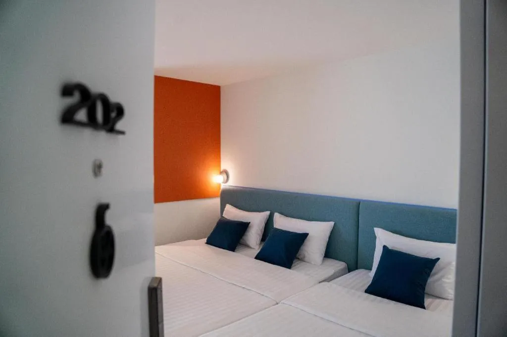 Bed in 777Bliss Hometel